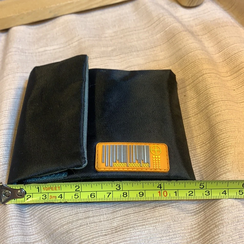 NWOT SurPlus foldable wallet w/bungee leash
